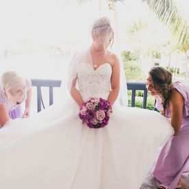 A wedding dress being altered